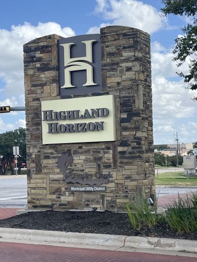 a masonry monument sign for Highland Horizon in Austin, TX